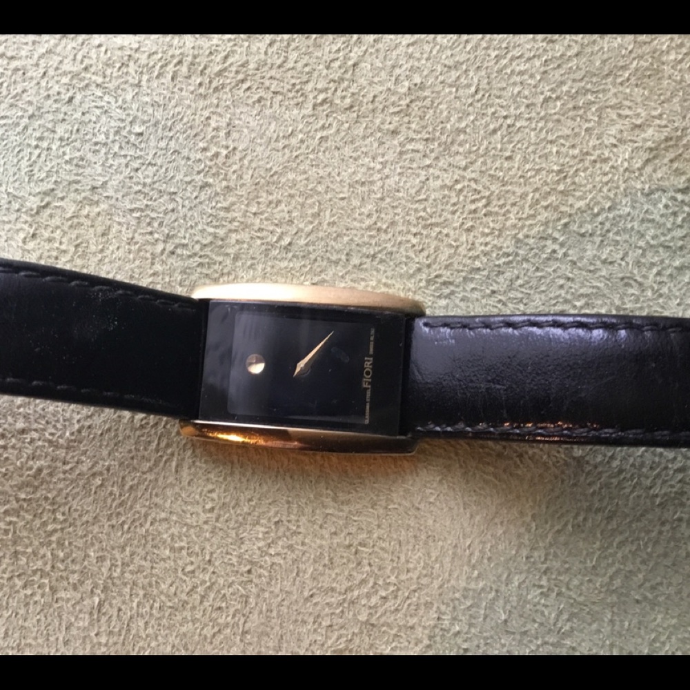 Lady watch. Nicely used. Black leather bracelet